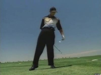 jouer le swing de golf de Tiger Wood